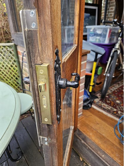 Rebated sashlock and anti-thrust plate fitted to this patio door for extra security