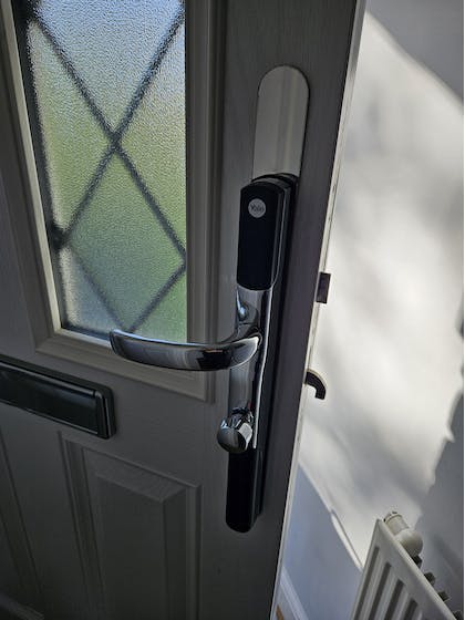Yale Smartlock fitted with repair plates to cover up the previous lock fixing points